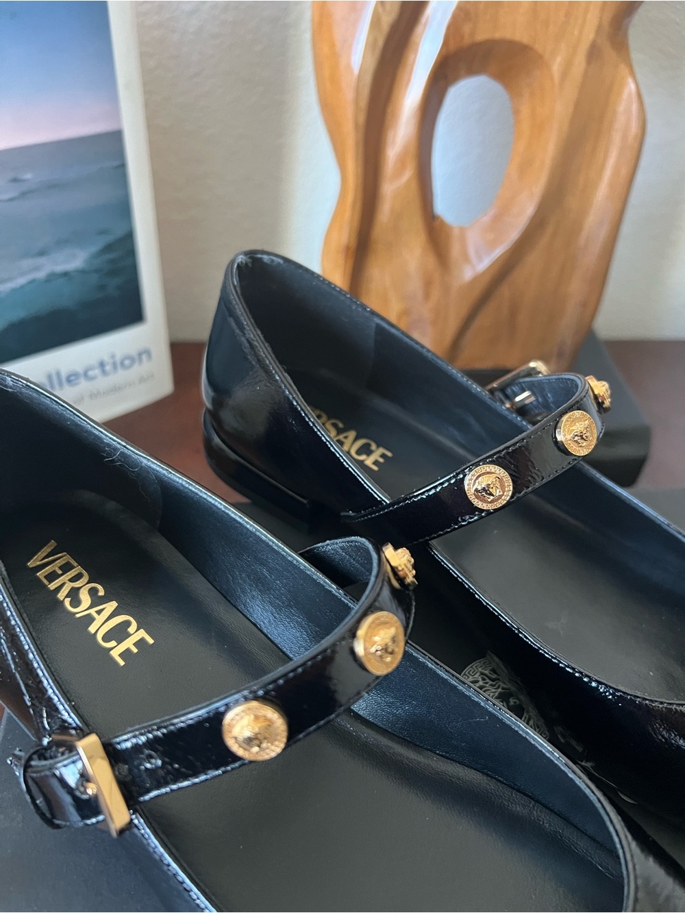 New! Versace Black Patent Leather Mary Jane Flats with Gold Medallion Strap.